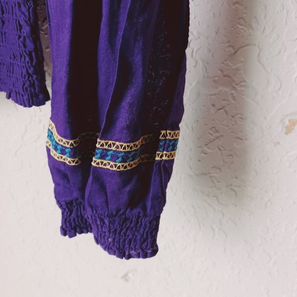 Purple, with gold and aqua color design stitching. Long sleeve crop top. - Picture 4 of 7